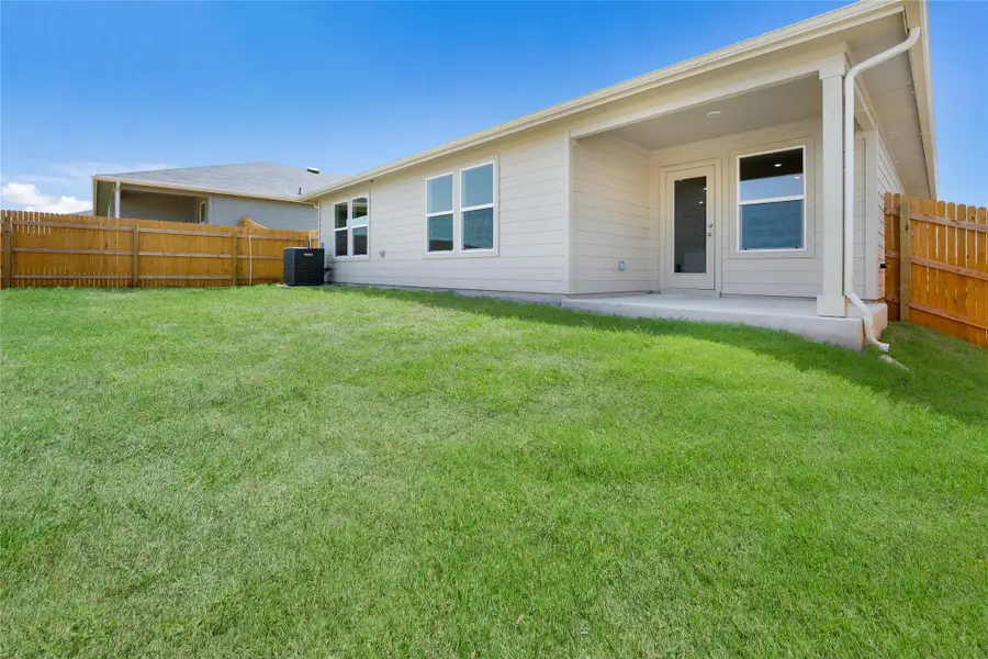 Exterior details and patio area of a home in Southgrove, Kyle (Image 3). Exterior details and patio area of a home in Southgrove, Kyle (Image 3).