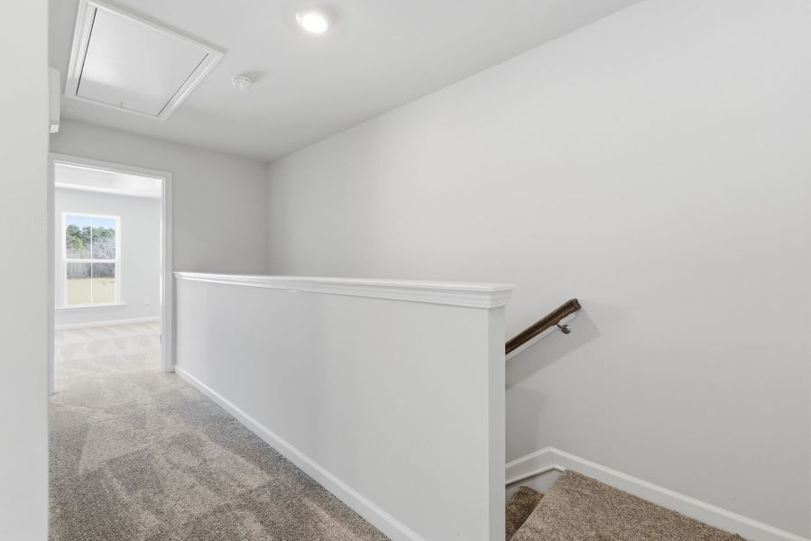 Spacious, unfurnished interior of a new home in Poets Walk, Whitsett (Image 48).