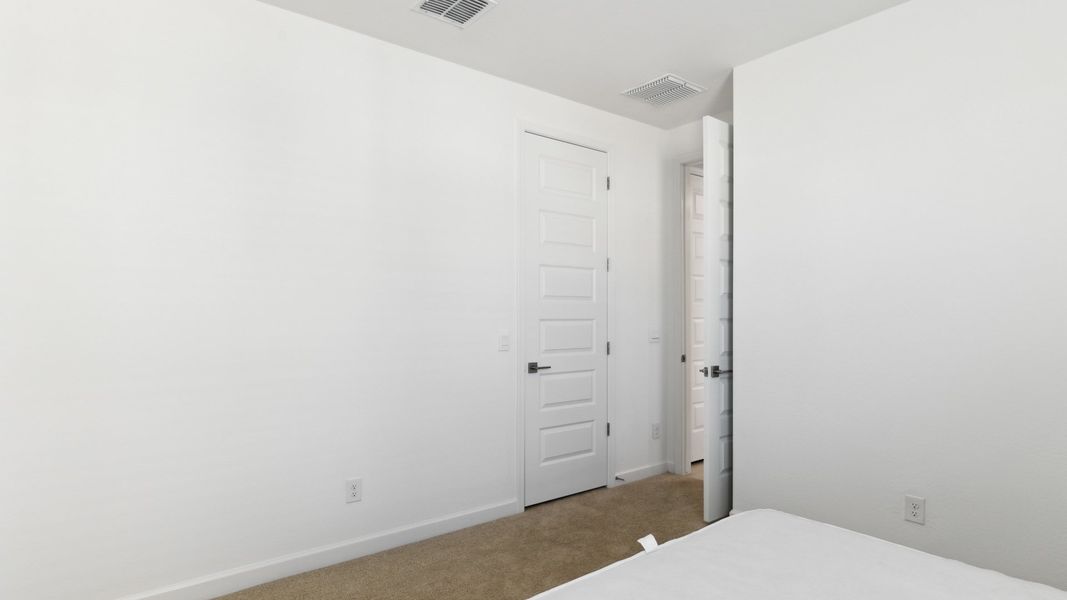 Spacious, unfurnished interior of a new home in Desert Moon Estates, Buckeye (Image 23).