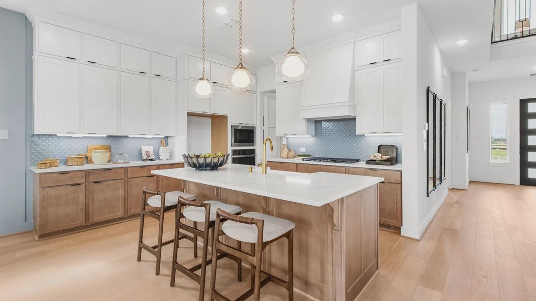Furnished interior view inside a new home in Bridgeland Central, Cypress (Image 5).