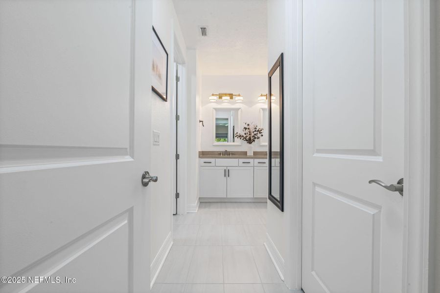 Furnished interior view inside a new home in Summer Bay at Grand Oaks, St. Augustine (Image 23). Furnished interior view inside a new home in Summer Bay at Grand Oaks, St. Augustine (Image 23).