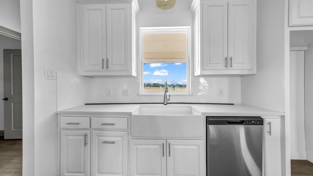 Great view of your backyard from the sink with granite countertops