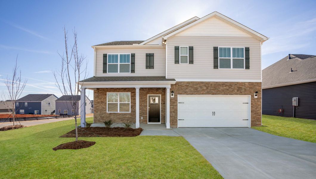 Front exterior of a new home in Spring Ridge, Anderson, SC, highlighting curb appeal (Image 1).