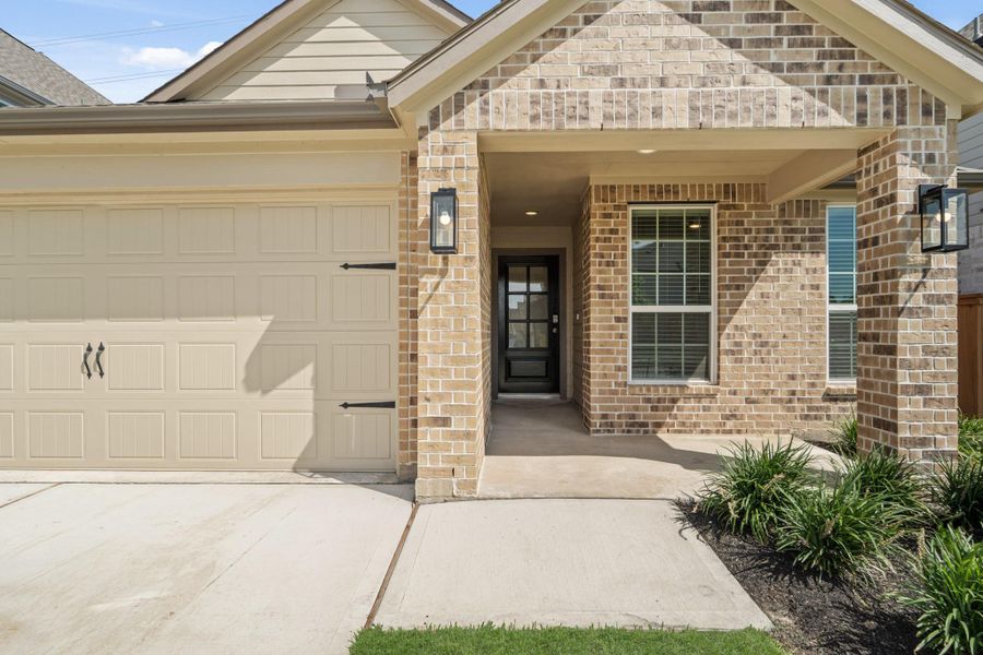 Exterior details and patio area of a home in Sunterra North, Katy (Image 4). Exterior details and patio area of a home in Sunterra North, Katy (Image 4).