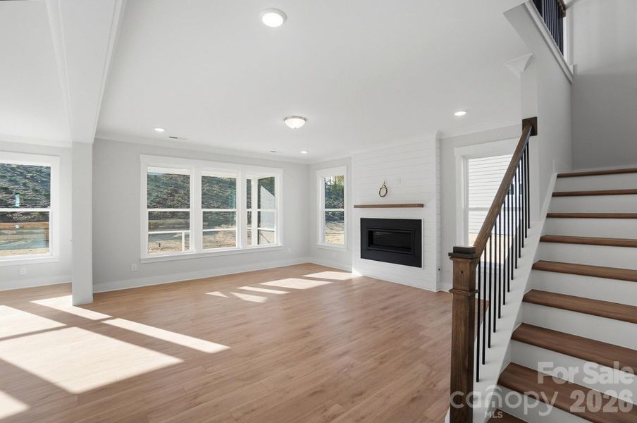 Family room with Cosmo fireplace and shiplap feature wall