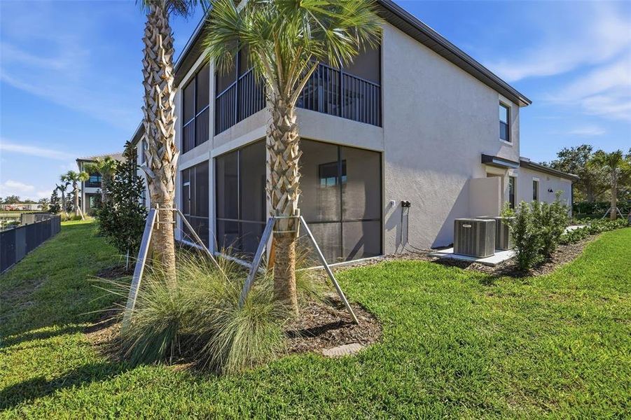 Exterior details and patio area of a home in Legends Cove, Bradenton (Image 4).