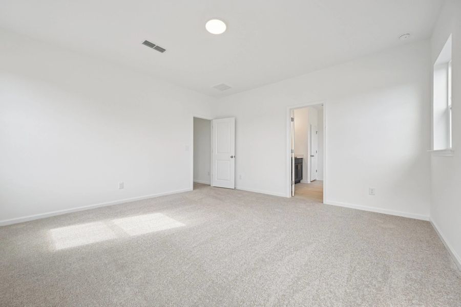 Primary Bed featuring the AW Collection® Sapphire - Confident style in layered textures and color.