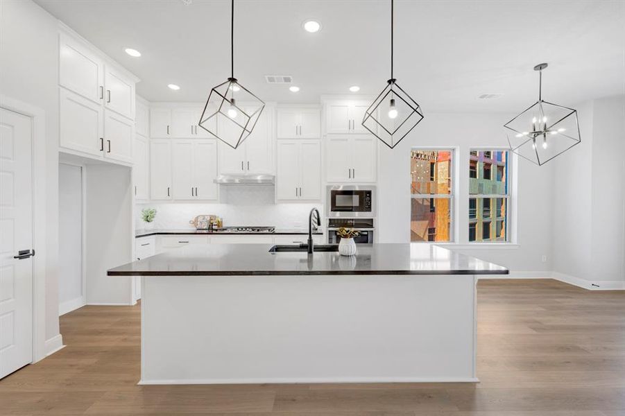 Furnished interior view inside a new home in Hillside at Las Colinas, Irving (Image 8). Furnished interior view inside a new home in Hillside at Las Colinas, Irving (Image 8).