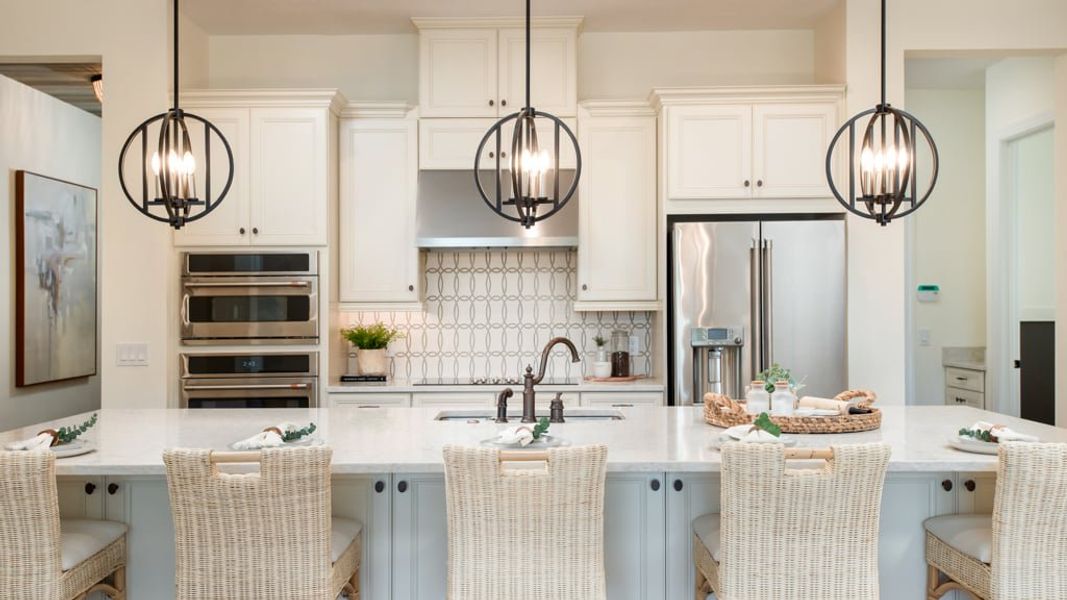 Representative furnished interior of a home built from the Ambra by Taylor Morrison in Astor Creek Golf and Country Club, Port St. Lucie (Image 8).