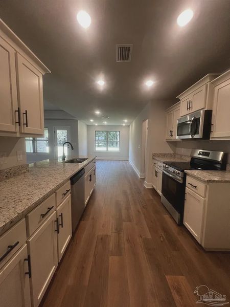 Furnished interior view inside a new home in Blossom Grove, Milton (Image 8).
