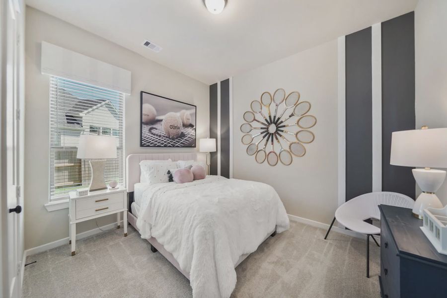 Representative furnished interior of a home built from the Montgomery by Chesmar Homes in Meridiana 50's and 60's, Manvel (Image 6).