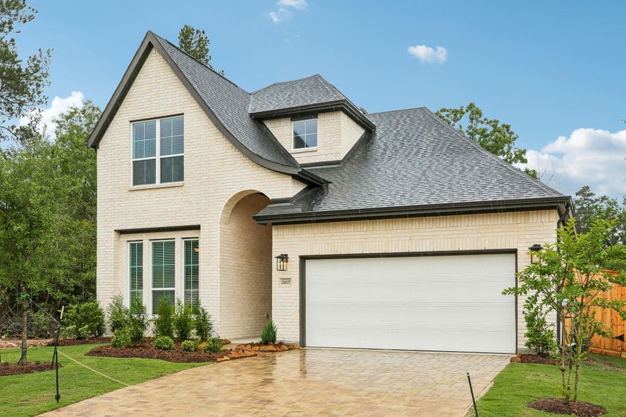 Front exterior of a new home in , Montgomery, TX, highlighting curb appeal (Image 21). Front exterior of a new home in , Montgomery, TX, highlighting curb appeal (Image 21).