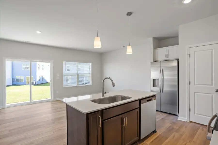 Furnished interior view inside a new home in West Main Townhomes, Sanford (Image 7).