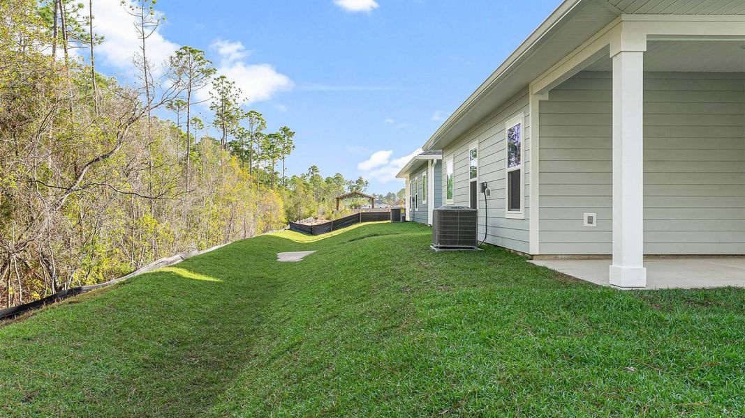 Exterior details and patio area of a home in Pine Creek and Heron Walk, Port Saint Joe (Image 21). Exterior details and patio area of a home in Pine Creek and Heron Walk, Port Saint Joe (Image 21).