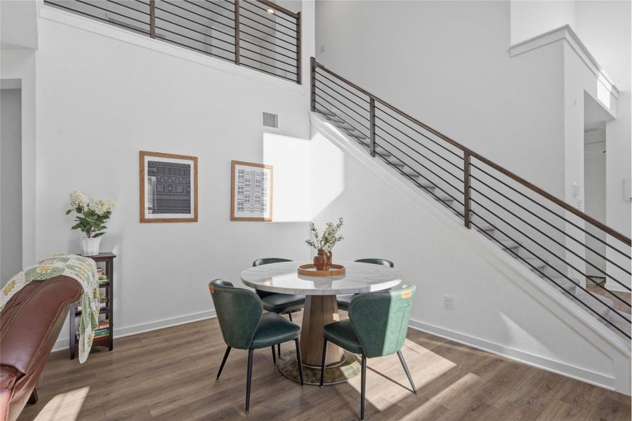 Dining space with high ceilings