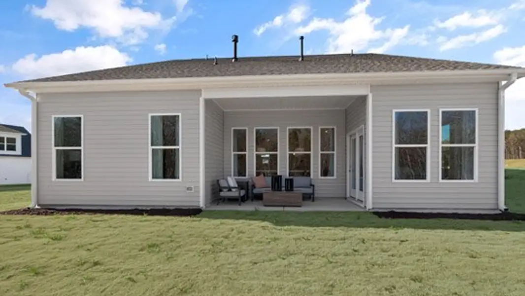 Exterior details and patio area of a home in The Villas at Galvins Ridge, Sanford (Image 2). Exterior details and patio area of a home in The Villas at Galvins Ridge, Sanford (Image 2).