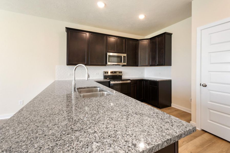 Furnished interior view inside a new home in , Snook (Image 3). Furnished interior view inside a new home in , Snook (Image 3).