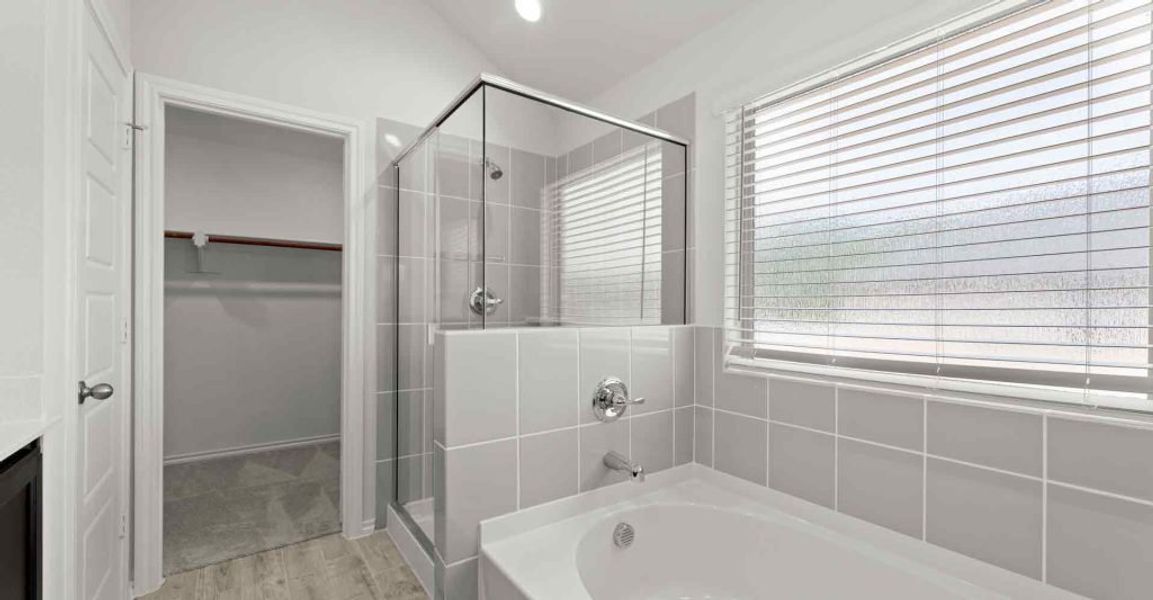 Representative exterior photo of a completed home built from the Atlanta by Impression Homes in Keeneland, Aubrey, TX (Image 16).