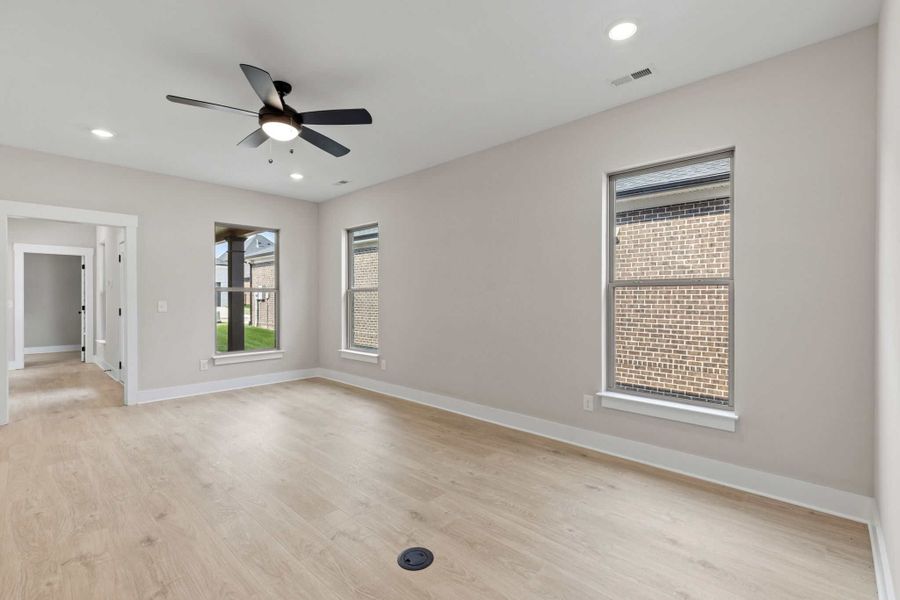 Spacious, unfurnished interior of a new home in The Paddock Courtyard, Bungalow, & Villa Homes, Gallatin (Image 6).