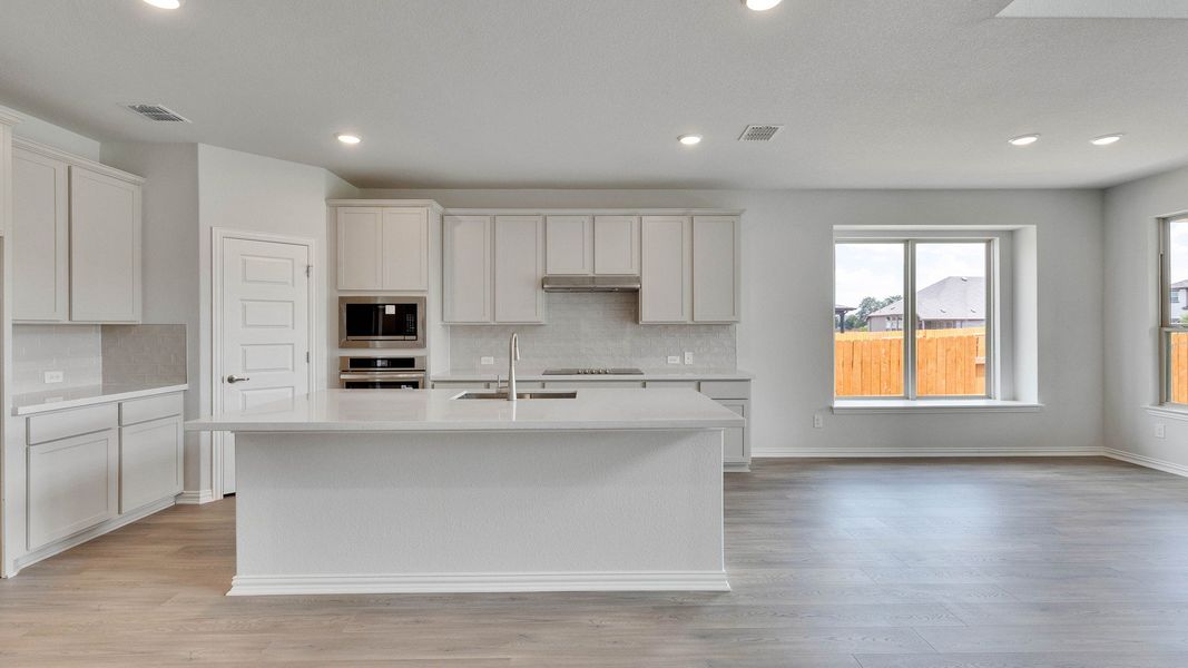 Furnished interior view inside a new home in Oaks at San Gabriel, Georgetown (Image 7).