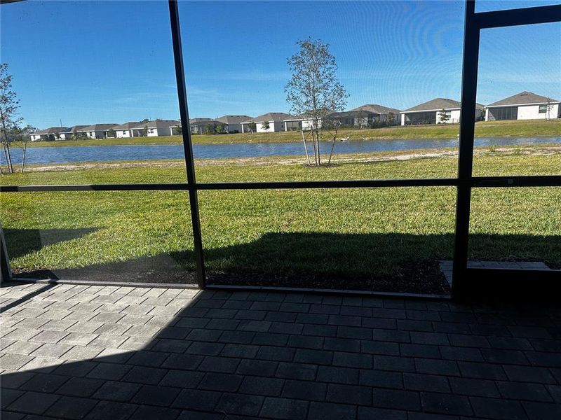 Exterior details and patio area of a home in Island Lakes at Coco Bay: Executive Homes, Englewood (Image 3). Exterior details and patio area of a home in Island Lakes at Coco Bay: Executive Homes, Englewood (Image 3).