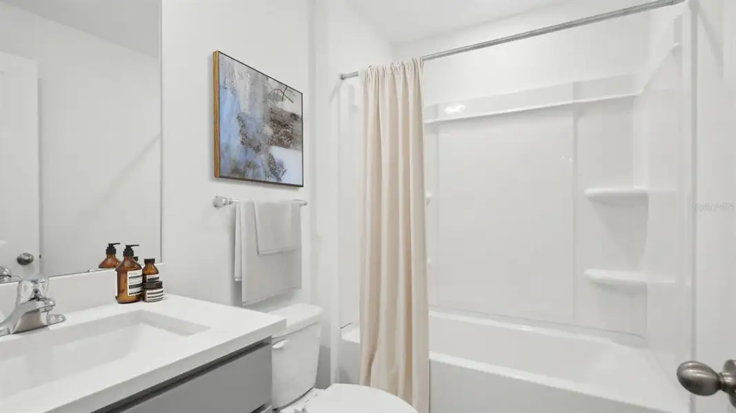 Furnished interior view inside a new home in Emerson Pointe, Ocala (Image 13).