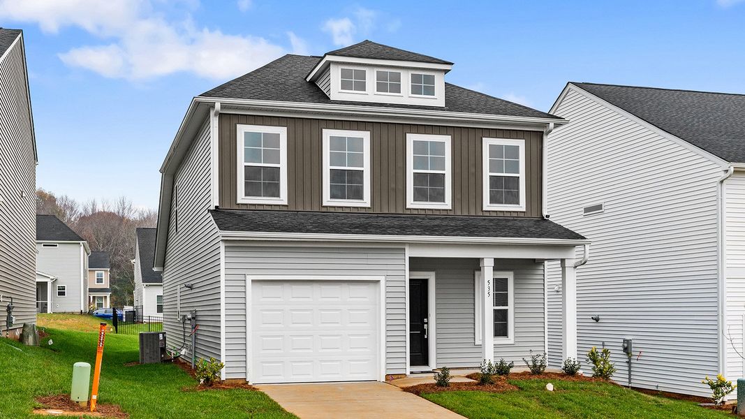 Front exterior of a new home in Hanes Lake, Winston-Salem, NC, highlighting curb appeal (Image 2).