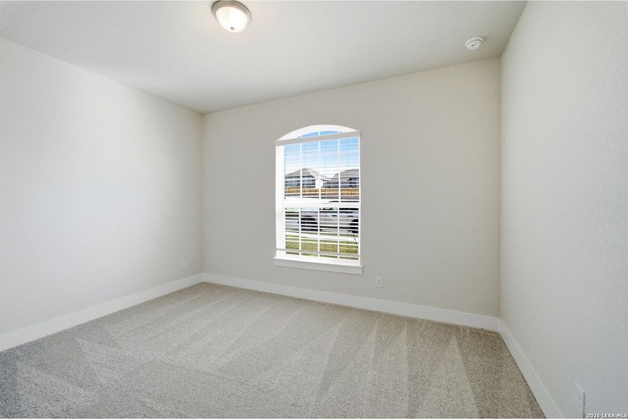 Spacious, unfurnished interior of a new home in The Woodlands at Medina Hills, Mico (Image 30).