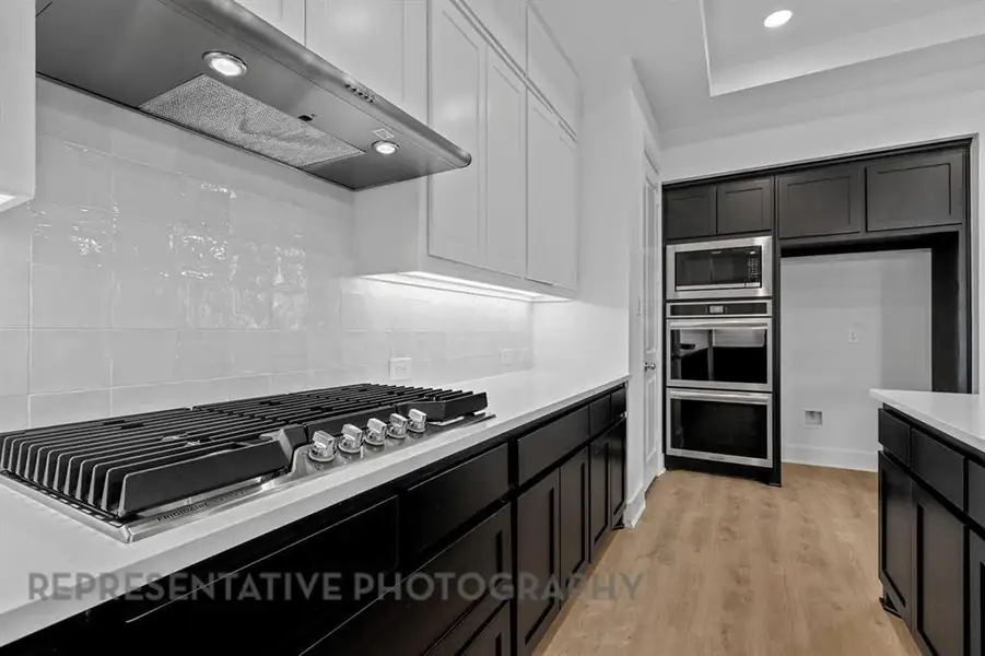 Furnished interior view inside a new home in Mosaic: 60ft. lots, Celina (Image 5).