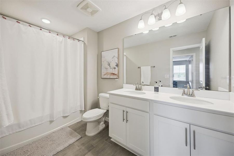 Furnished interior view inside a new home in Seasons at The Grove, Mascotte (Image 21).