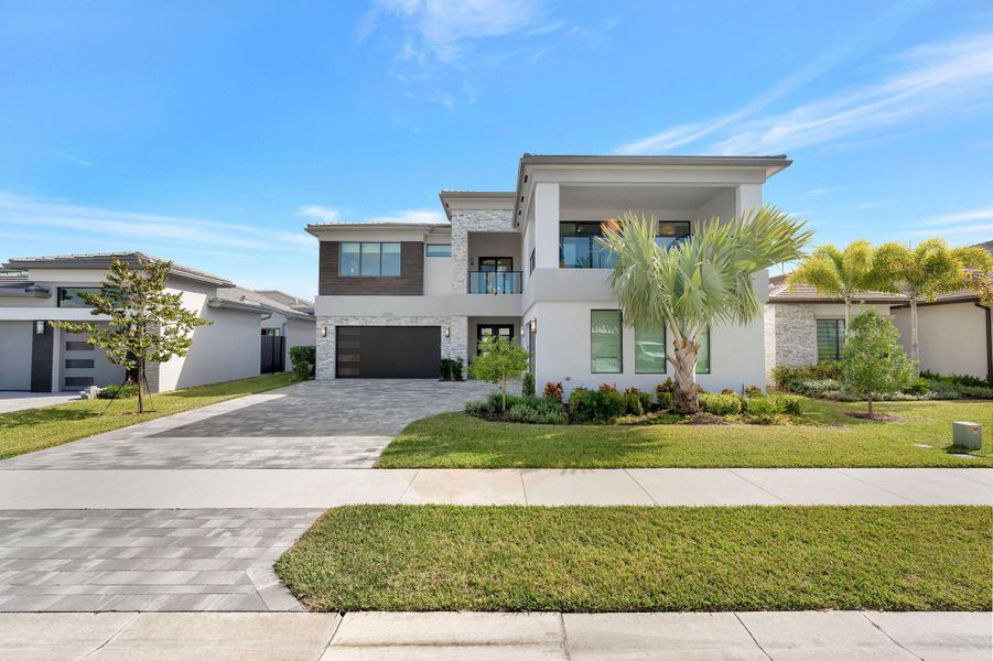 Front exterior of a new home in , Boca Raton, FL, highlighting curb appeal (Image 32). Front exterior of a new home in , Boca Raton, FL, highlighting curb appeal (Image 32).