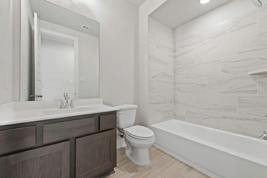 Furnished interior view inside a new home in The Trails, New Caney (Image 9).