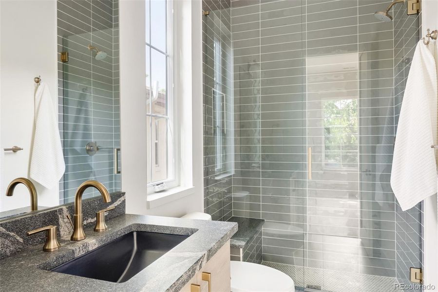 En suite bath for 2nd of 3 bedrooms on upper level