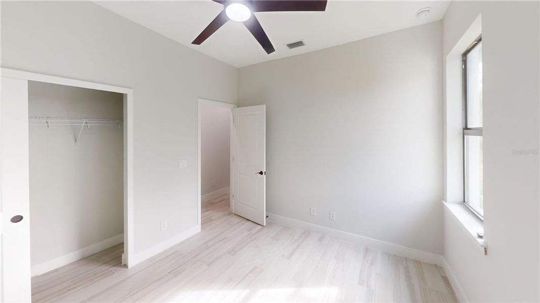 Spacious, unfurnished interior of a new home in , Port Charlotte (Image 11).