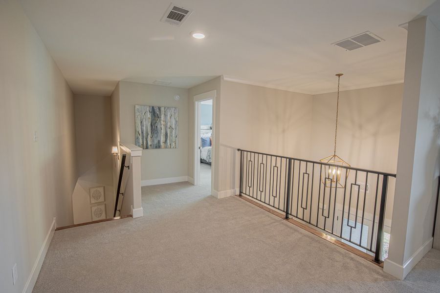 Representative unfurnished interior of a home built from the Huntington by Grant & Co in White Oak, Arlington (Image 22).