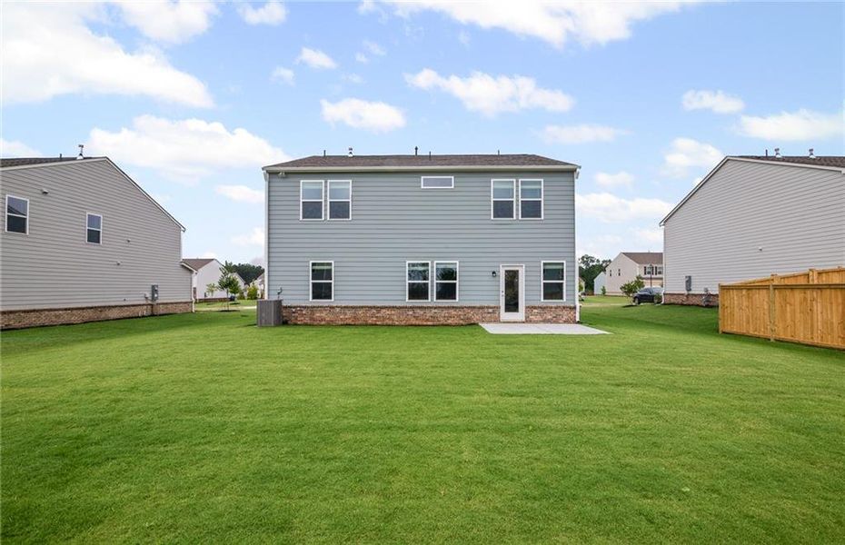 Exterior details and patio area of a home in Anderson Point, McDonough (Image 2).