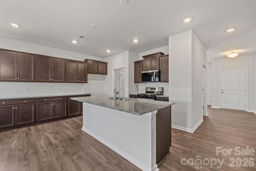 Furnished interior view inside a new home in McFarland Estates, York (Image 7).
