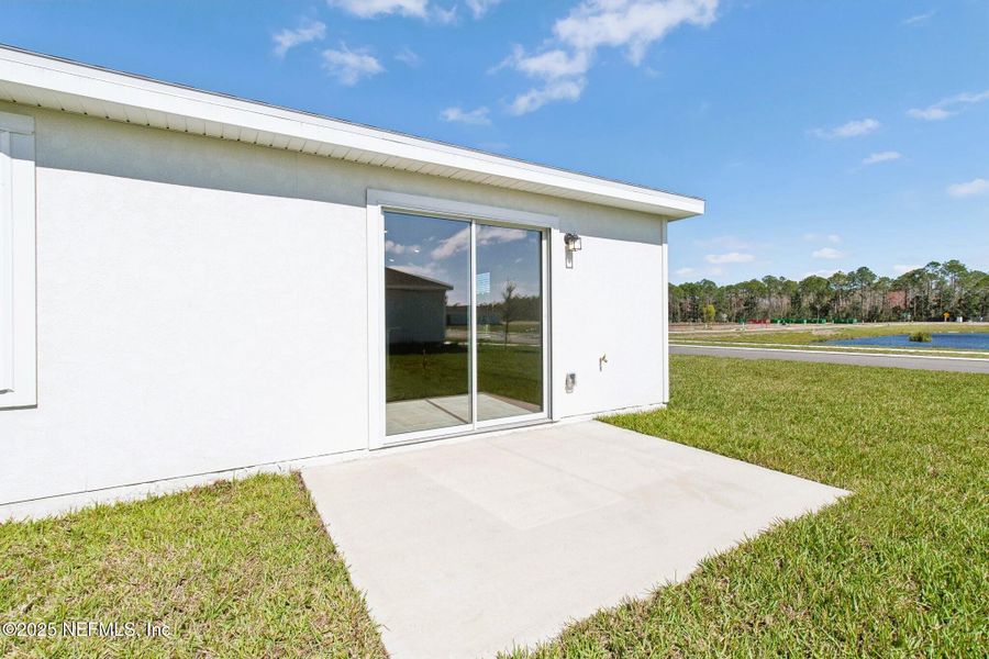 Exterior details and patio area of a home in Flagler Village - Classic Series, Palm Coast (Image 22).