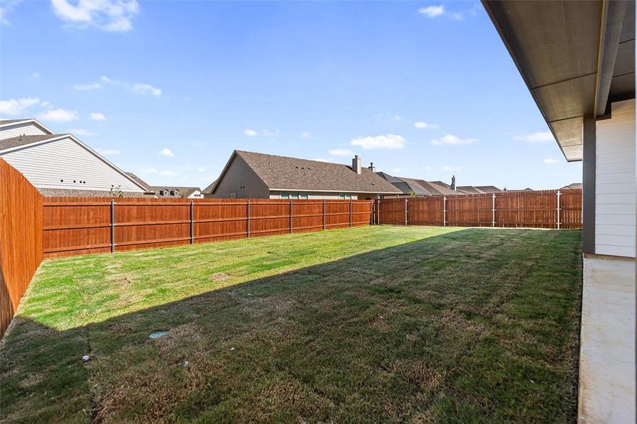 Exterior details and patio area of a home in Covenant Park, Springtown (Image 2). Exterior details and patio area of a home in Covenant Park, Springtown (Image 2).