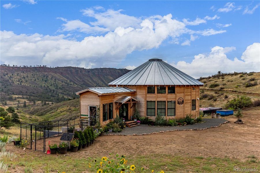 Front exterior of a new home in , Lyons, CO, highlighting curb appeal (Image 23).
