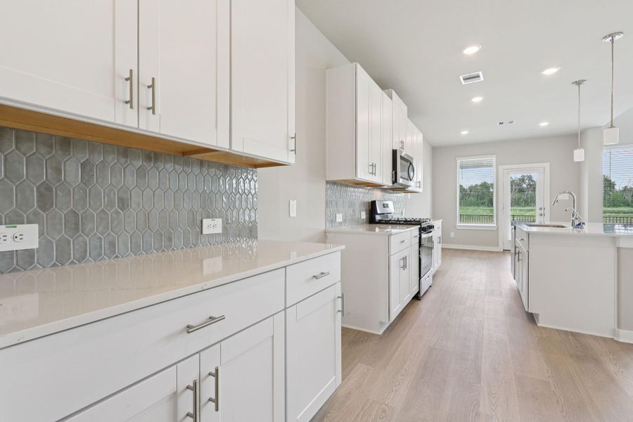 Photo is not of the actual home, but is an inspirational photo of builder’s model home and may depict options, furnishings, and/or decorator features that are not included