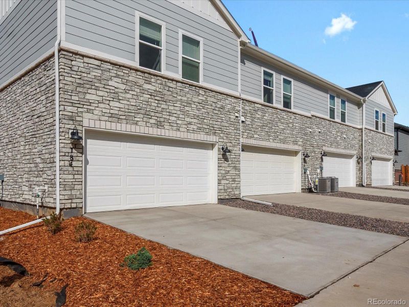 Front exterior of a new home in Horizon Uptown: The Meadow Collection, Aurora, CO, highlighting curb appeal (Image 2). Front exterior of a new home in Horizon Uptown: The Meadow Collection, Aurora, CO, highlighting curb appeal (Image 2).