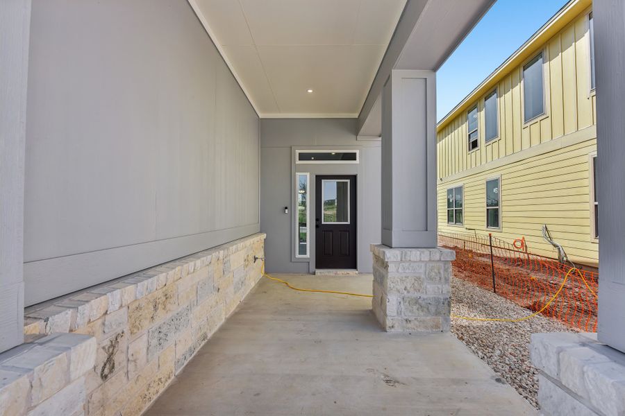 Exterior details and patio area of a home in Saddle Ridge at Wildhorse Ranch, Austin (Image 2). Exterior details and patio area of a home in Saddle Ridge at Wildhorse Ranch, Austin (Image 2).
