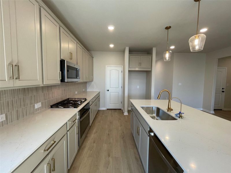 Furnished interior view inside a new home in Covered Bridge, Hutto (Image 5). Furnished interior view inside a new home in Covered Bridge, Hutto (Image 5).