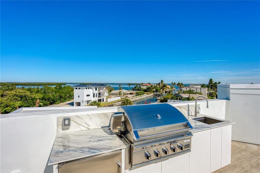Exterior details and patio area of a home in , Longboat Key (Image 51).