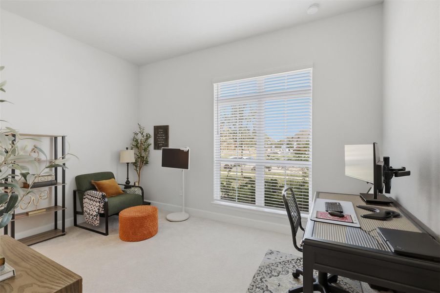 Secondary bedroom offers flexibility for family,guests or additional workspace. Secondary bedroom offers flexibility for family,guests or additional workspace.