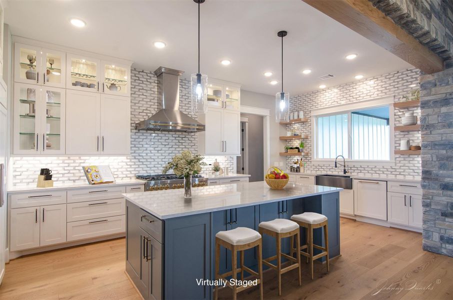 White oak beams and floating shelves accentuate this beautiful kitchen with quartz countertops and marble backsplash. White oak beams and floating shelves accentuate this beautiful kitchen with quartz countertops and marble backsplash.