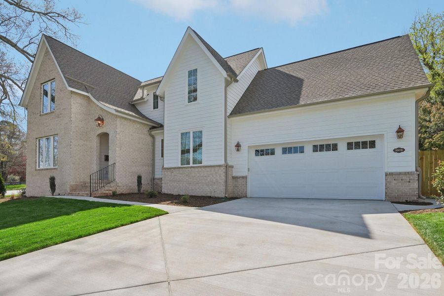 Front exterior of a new home in , Charlotte, NC, highlighting curb appeal (Image 27).