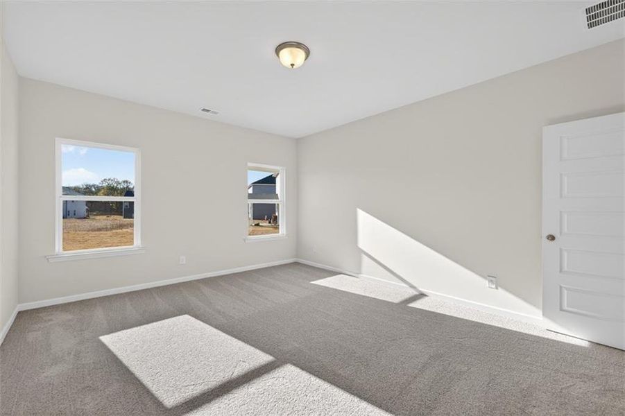 Spacious, unfurnished interior of a new home in Roxeywood Park, Winder (Image 22).