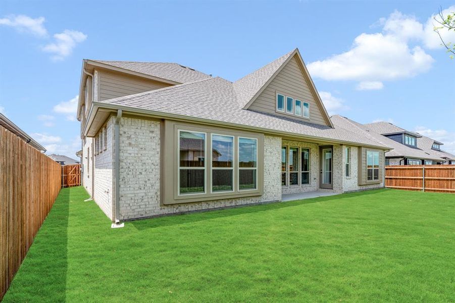 Exterior details and patio area of a home in Wildflower Ranch 60-65, Justin (Image 22). Exterior details and patio area of a home in Wildflower Ranch 60-65, Justin (Image 22).